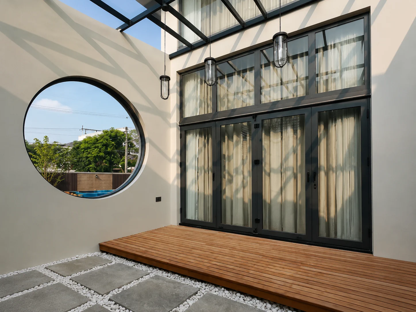 Teak deck platform in a light-filled residential courtyard